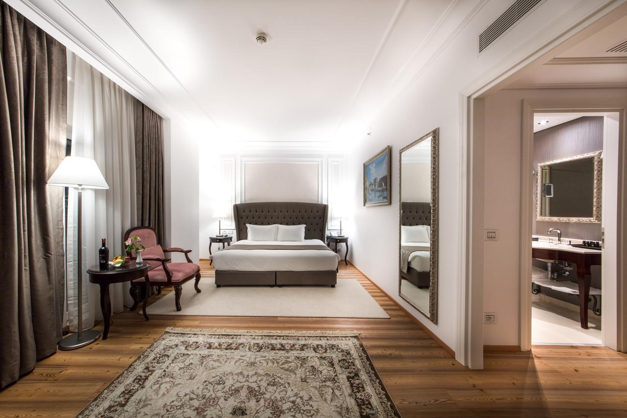 Xheko Imperial Luxury Hotel & Spa تيرانا المظهر الخارجي الصورة A bedroom at the hotel