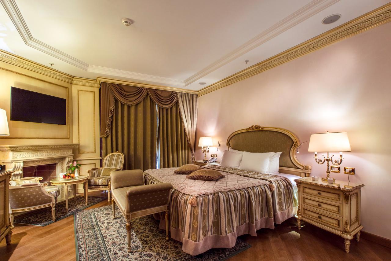 Xheko Imperial Luxury Hotel & Spa تيرانا المظهر الخارجي الصورة A bedroom at the hotel